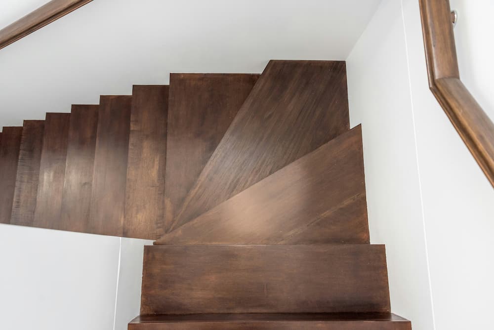 Bespoke hardwood winder staircase in a Barnet period home