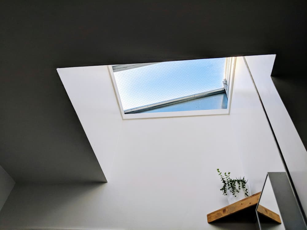 Bright loft room with Velux rooflights in a Hertfordshire home